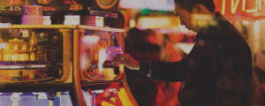 Man using gambling machine