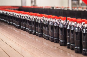 Production line of cola bottles to emphasis consistency